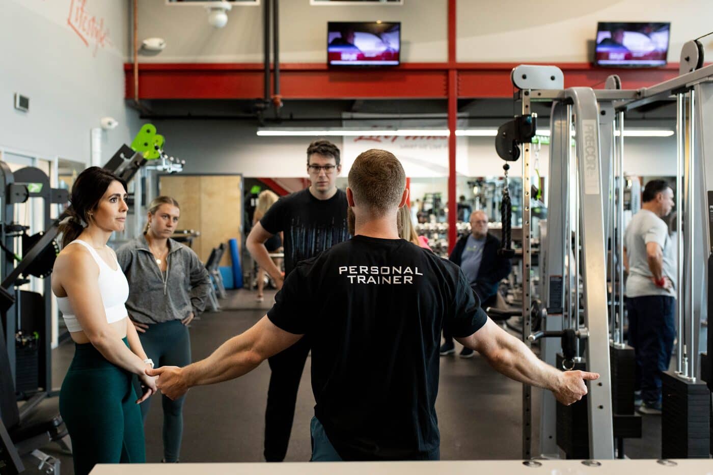 Members training together in a coached small group.